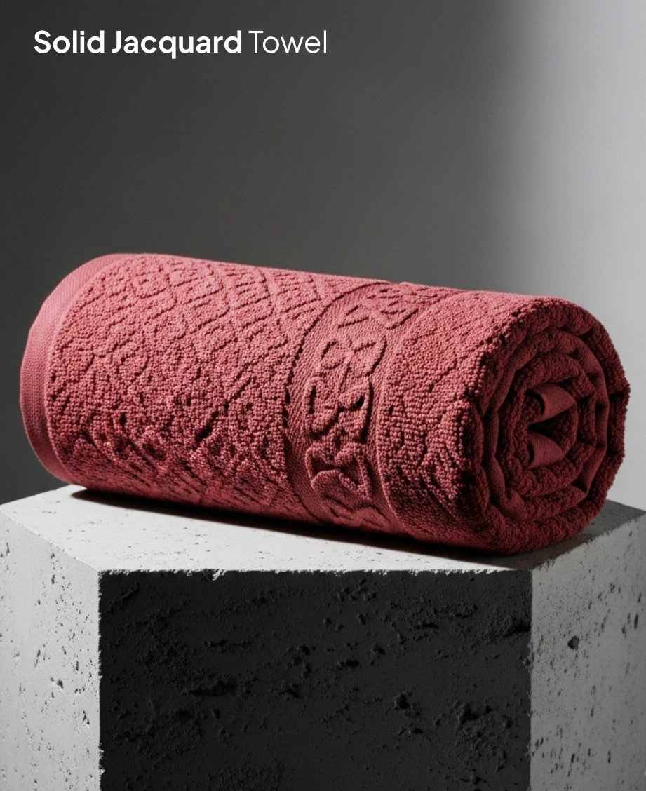 Rose Jacquard towel on concrete block